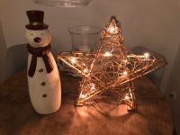 Leuchtender Weihnachtsstern und großer Schneemann aus Keramik Nordrhein-Westfalen - Oberhausen Vorschau