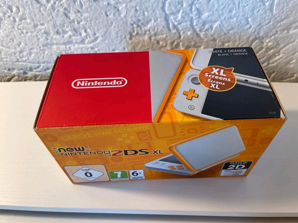 New Nintendo 2DSXL, weiß-orange, neuwertig in Sauerlach