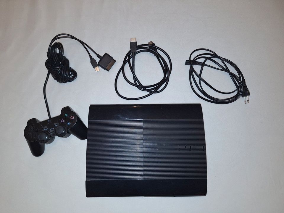 Playstation 3 SuperSlim (500gb) + Controller + 7 Spiele in Schwäbisch Hall