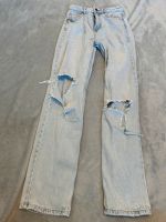 blaue High Waist Jeanshose mit Löchern von NewYorker Gr.XS Nordrhein-Westfalen - Neuenkirchen Vorschau