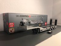 Siku Control 6723 3-Achs-Tieflader Silber mit Akku 1:32 Niedersachsen - Celle Vorschau
