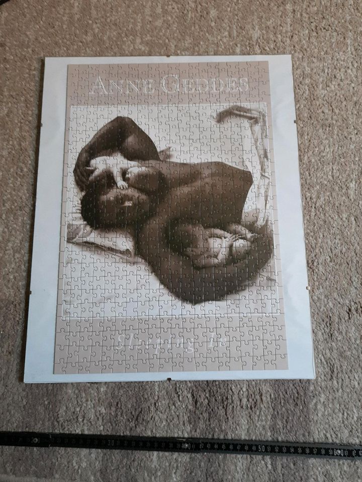 Anne Geddes Puzzle Mann mit Baby im Bilderrahmen in Bad Hersfeld