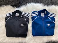 2 Adidas SST Jacken (schwarz und blau) Dresden - Leuben Vorschau
