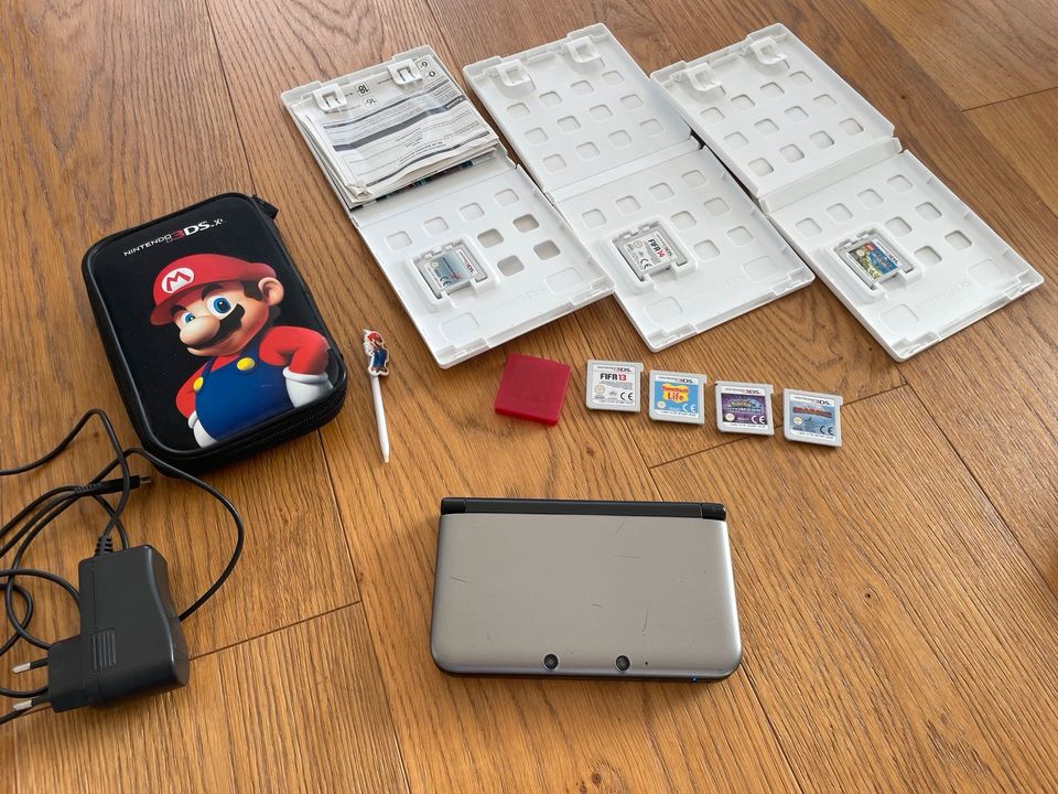 Nintendo 3 DS XL inkl. Tasche und 7 Spiele in Undenheim