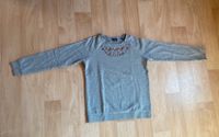 Grauer Tchibo Pullover mit Strasssteinen Größe 36/38 Hessen - Biedenkopf Vorschau