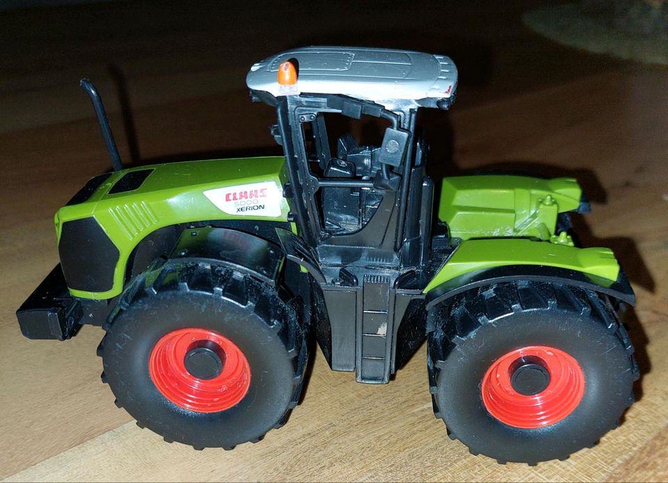 Spielzeug Traktor, ca 16 cm lang in Hanstedt