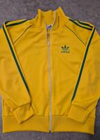 Adidas Jacke Firebird in gelb mit grünen Streifen Nordrhein-Westfalen - Oerlinghausen Vorschau