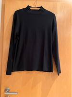 Schwarzer schlichter Rollkragen Pullover von Olsen Größe 42 Hessen - Eschenburg Vorschau