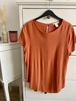 Shirt in rostrot/orange von H&M zu verkaufen - Größe 38 Saarland - Ensdorf Vorschau