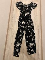 Jumpsuit Overall schwarz mit Blumen Gr. 44 XXL wie neu Nordrhein-Westfalen - Horn-Bad Meinberg Vorschau