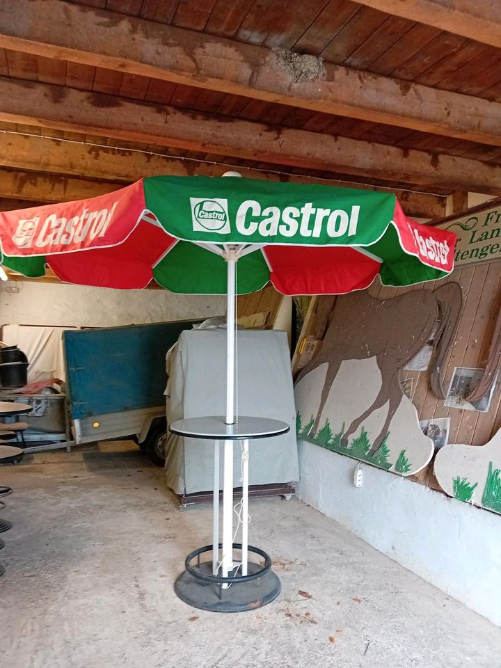 Sonnenschirm mit Stehtisch " Castrol " in Anröchte