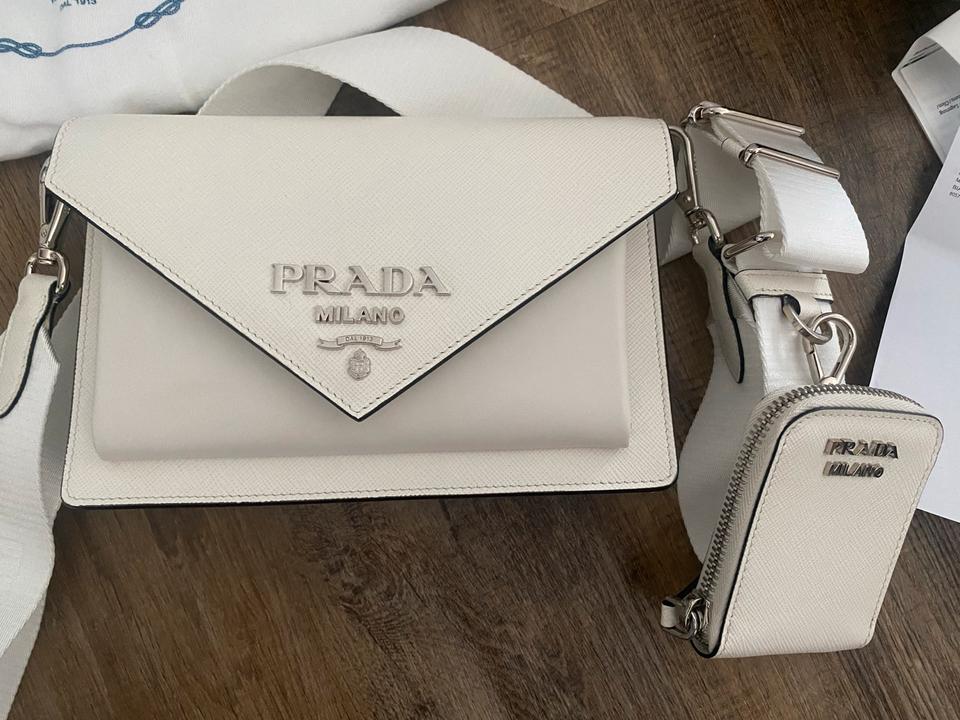 Prada clutch beige sale