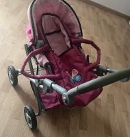 Puppenwagen rosa mit Tasche u mit Regenschutz Nordrhein-Westfalen - Rommerskirchen Vorschau