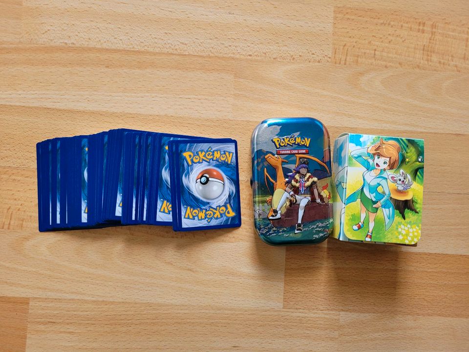 50 Pokemon Karten boosterfrisch + 1 Mini Tin oder Deck Box in Berlin