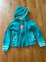 Strickjacke türkis mit Ampelmädchen mini Ampelmann Größe 86/92 Berlin - Hellersdorf Vorschau