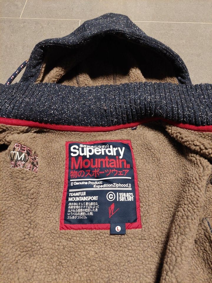 Superdry Herren Jacke Größe L Fleece warm Kapuze dunkelgrau in Sankt Augustin