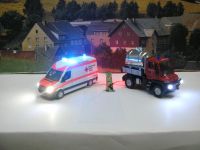 Modellauto 1:87 RTW + Unimog mit super Smd led Beleuchtung Duisburg - Walsum Vorschau