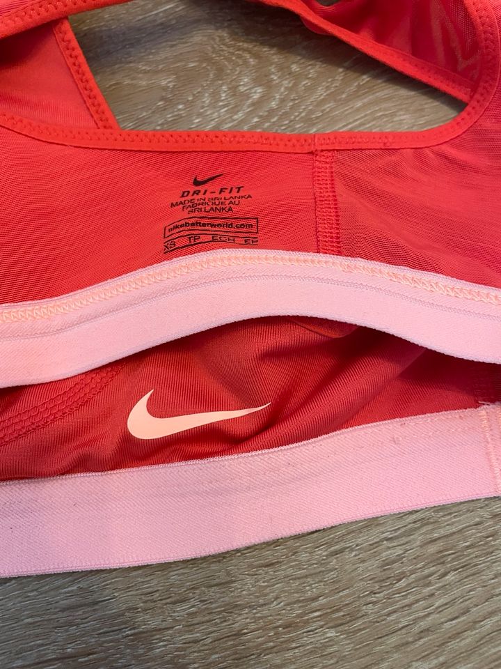 NIKE DRI FIT Sport BH in Erkelenz