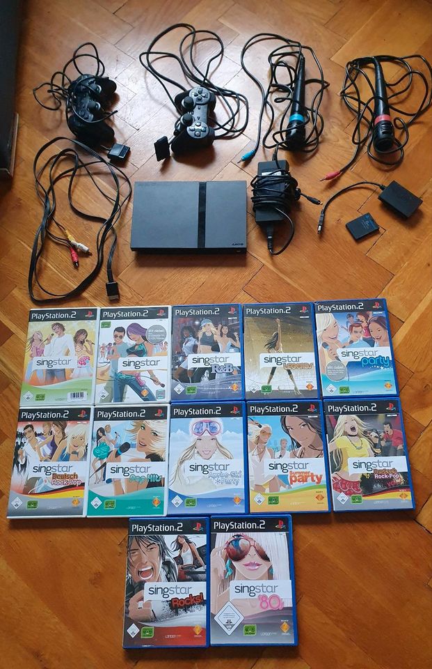 Sony PlayStation 2 Slim Konsole + 10 singstar, Memorycard, Mikro in Berlin