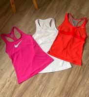 3 Nike Sporttops (Pink,weiß,korallfarben) Gr.S Rheinland-Pfalz - Bad Kreuznach Vorschau
