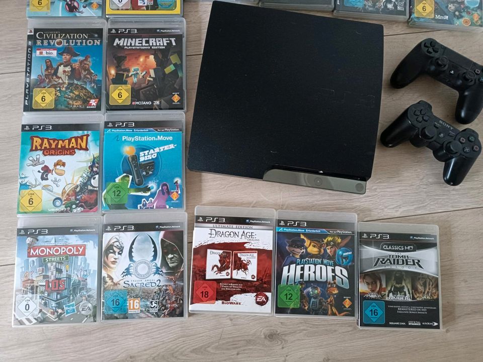 Playstation 3 + 2 Controller + 15 Spiele in Emmerthal