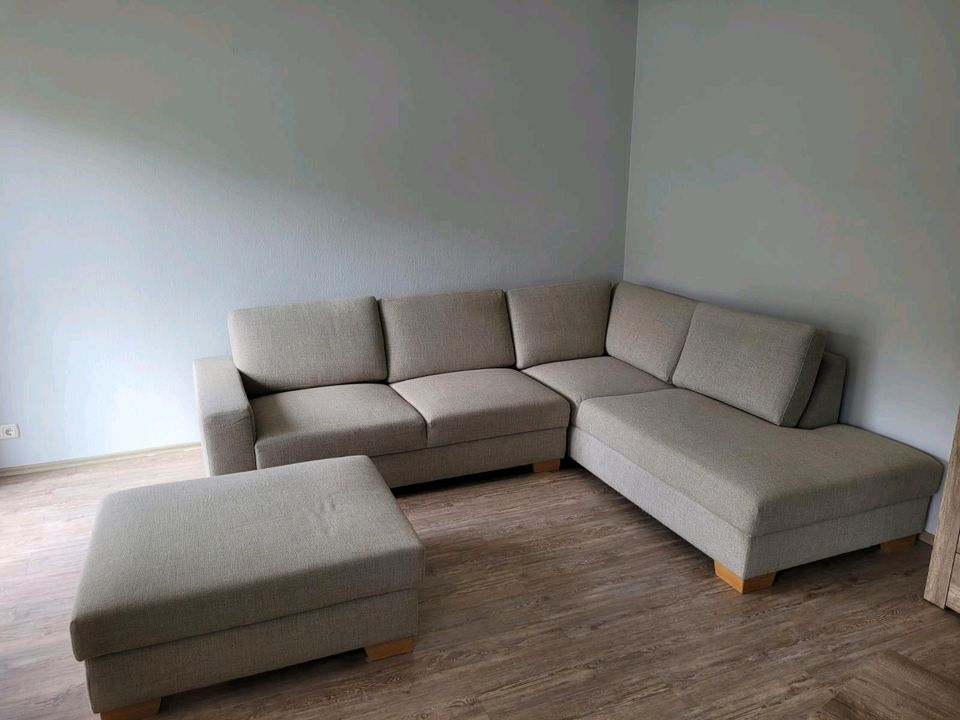 IKEA Couch in L-Form Farbe beige inkl. Hocker in Plettenberg