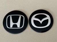 4 Aufkleber Embleme für Radkappen Nabendeckel HONDA MAZDA 56mm Rheinland-Pfalz - Pelm Vorschau