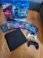 Playstation 4 Slim 1TB in OVP + Zubehör und Spiele Niedersachsen - Bad Fallingbostel Vorschau