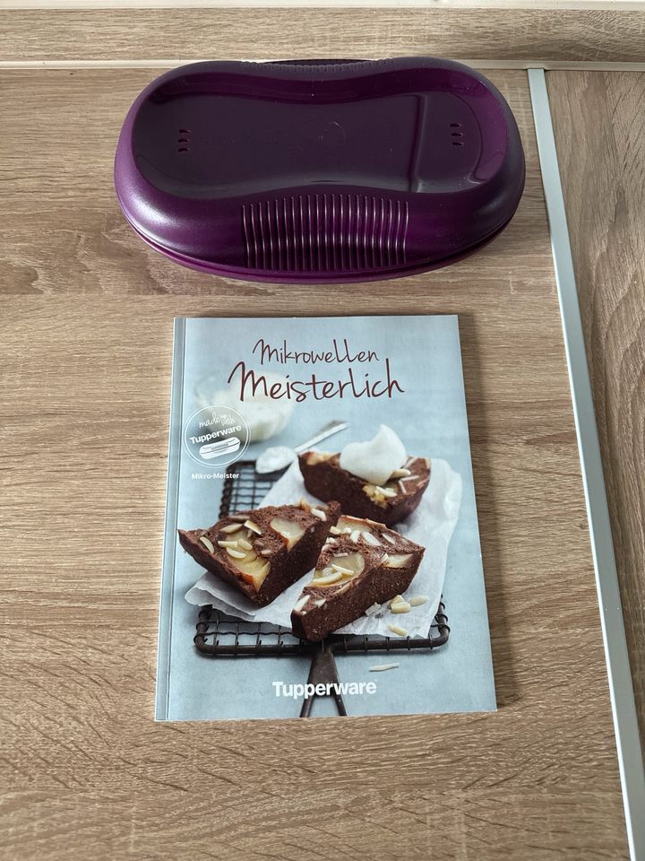 Tupperware Mirko-Meister lila mit Rezeptbuch in Hungen