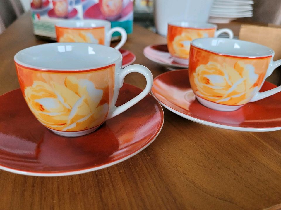 4 Espresso Tassen mit Untertassen in Orange, Rot in Quakenbrück