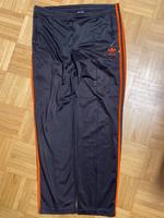 Adidas Firebird Vintage Sport Trainingshose Schwarz/Orange Gr.176 Düsseldorf - Urdenbach Vorschau