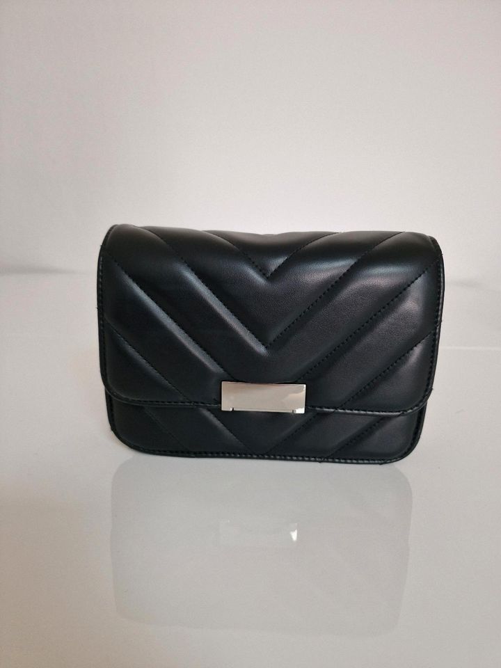 Clutch handtasche in Greven