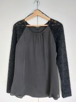 Schwarze Bluse mit Spitzenärmeln von Taifun in Größe 40 Baden-Württemberg - Karlsdorf-Neuthard Vorschau