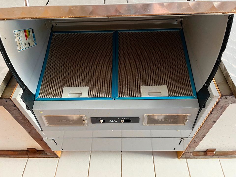 Einbauküche Industrielook Edelstahlfronten mit E-Geräten in Saarbrücken