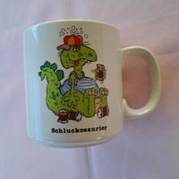 Schöne Tasse/Becher "Schluckosaurier" mit Beschreibung Rückseite Mecklenburg-Vorpommern - Kirch Jesar Vorschau