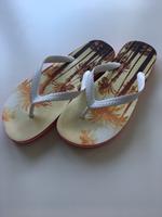 Flipflops, Gr. 44/45 (11), rot/weiß mit Palmen, gebraucht Nordrhein-Westfalen - Pulheim Vorschau