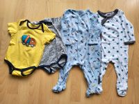 Babykleidung/Kleiderpaket mit 2 Bodys und 2 Schlafanzügen Gr. 68 Rheinland-Pfalz - Dierdorf Vorschau