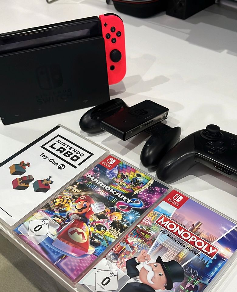Nintendo Switch mit 3 spiele case und Controller in Duisburg