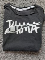 Schönes T-Shirt Sportshirt "Puma" schwarz Größe 152 Nordrhein-Westfalen - Hiddenhausen Vorschau