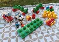 Lego Duplo Primo & Playmobil 123 2x Raupen Steine Figuren Feuerwe Baden-Württemberg - Laudenbach Vorschau