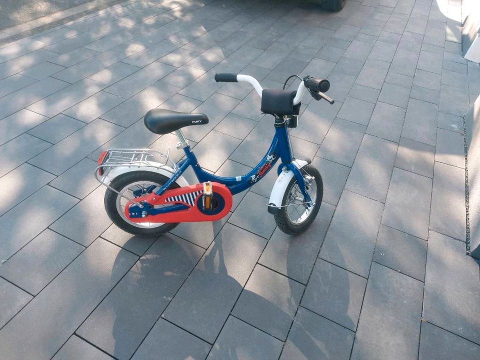 Kinderfahrrad mit Haltestange in Niederfischbach