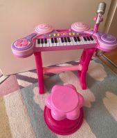 Kinderspielzeug-Musikinstrument, pink, mit Hocker und Mikrofon. Bayern - Landshut Vorschau