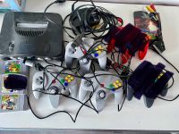 Nintendo 64 mit 3 Controllern und 2 Spielen Nordrhein-Westfalen - Neukirchen-Vluyn Vorschau