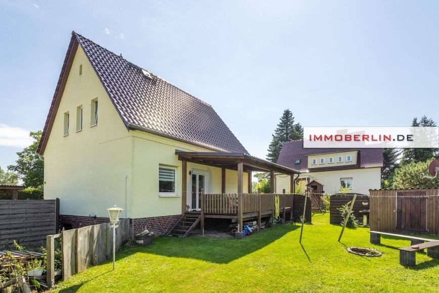 IMMOBERLIN.DE - Familienfreundliches Haus mit Südgarten in angenehmer Lage in Rietz