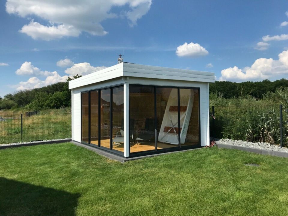 „Oskar“ Ferienhaus am See Urlaub Kurzurlaub Winterurlaub Sauna Kamin Boot Angeln Surfen in Delitzsch