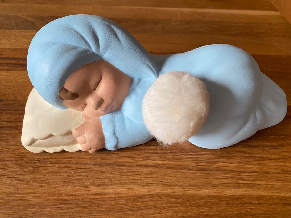 Spieluhr schlafendes Baby, blau aus Gießkeramik in Kamen