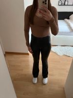 Beschichtete Leggings in schwarz Größe 32 Nordrhein-Westfalen - Minden Vorschau