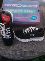 Skechers Damenschuhe  gr. 38 schwarz-silber Dresden - Blasewitz Vorschau