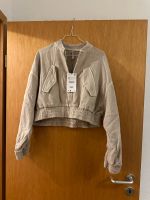 Beige Pilotenjacke aus Jersey mit Rissen (XS) Niedersachsen - Göttingen Vorschau