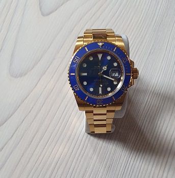 Rolex Submariner Date Vollgold/blau in Flensburg